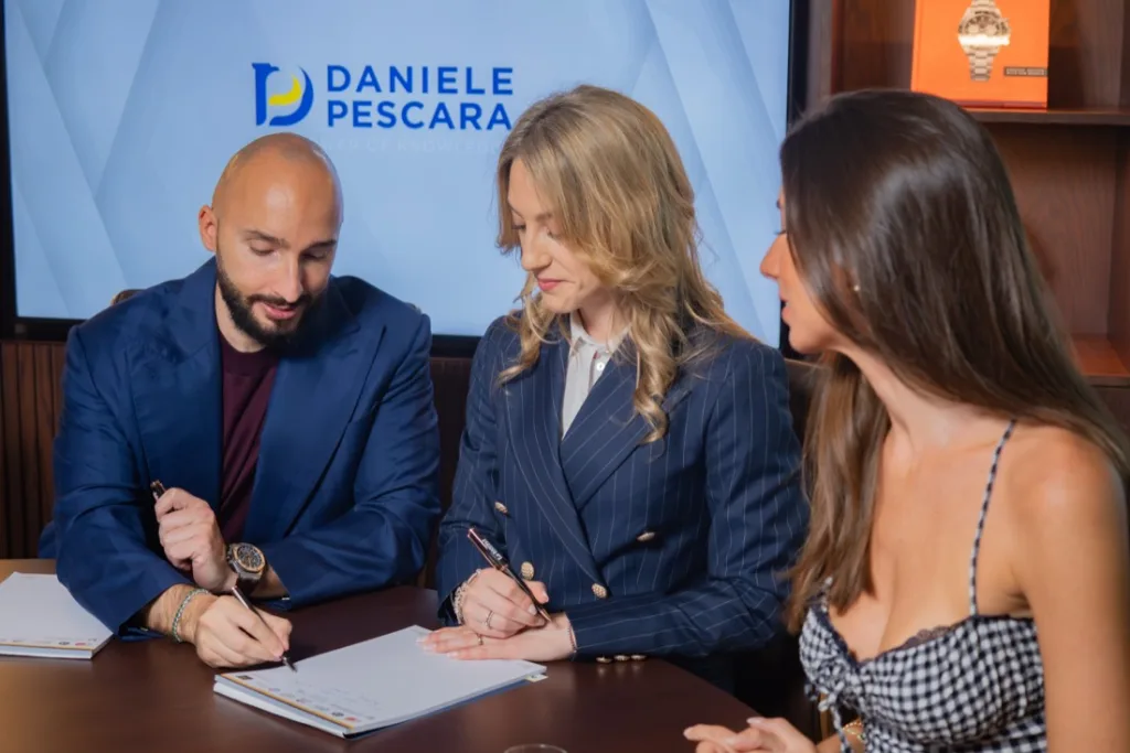 Team Daniele Pescara mentre firma un contratto